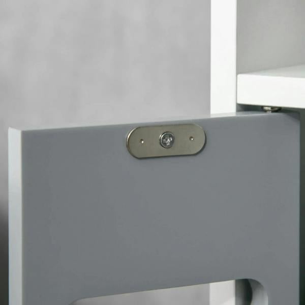 Metal pull plate on the grey cabinet door for secure opening