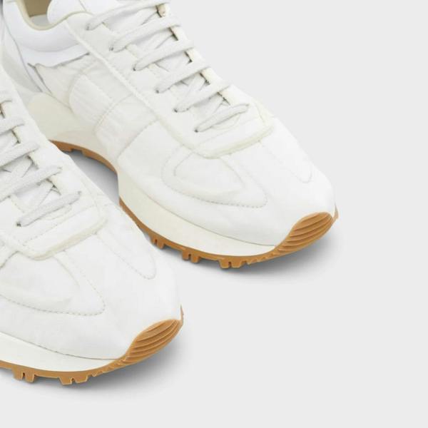 Supplied Fashion white Maison Margiela 50-50 sneakers with leather upper, tonal stitching, and gum rubber split sole.