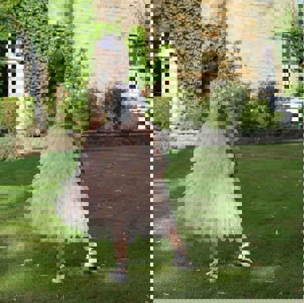 Young girl modelling her dress