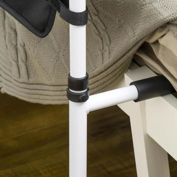 Close-up of white rail joint with black connector on adjustable bed assist bar