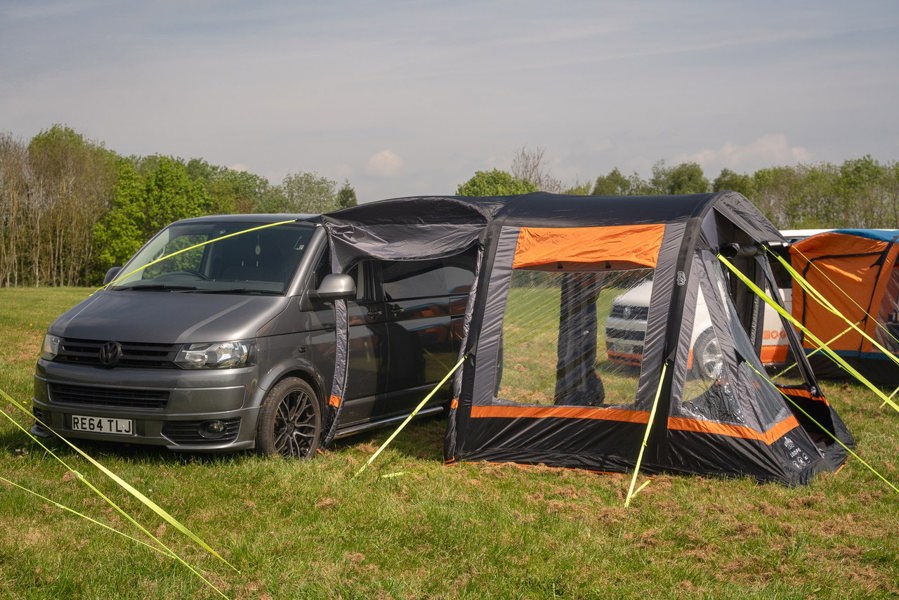 An OLPRO air awning with all of its doors open on a Volkswagen T5 Campervan imageset:Charcoal