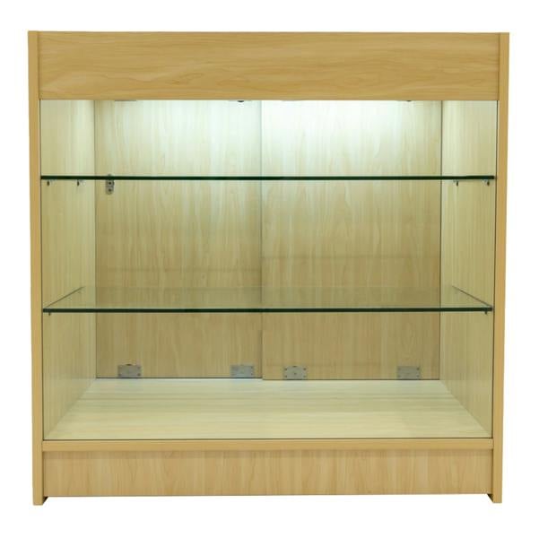 Helios LED shop counter set in maple finish featuring two glass shelves, illuminated interior, and sleek modern design