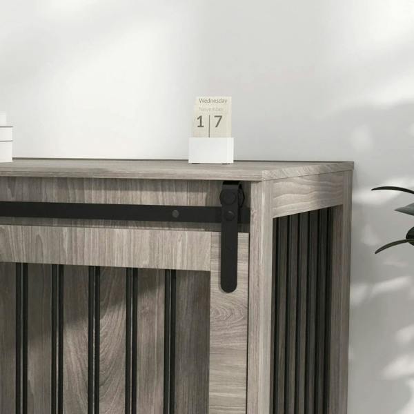 Walnut-brown dog crate furniture close-up of front latch and side slats