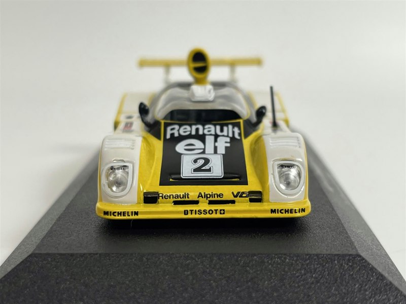 a yellow toy race car