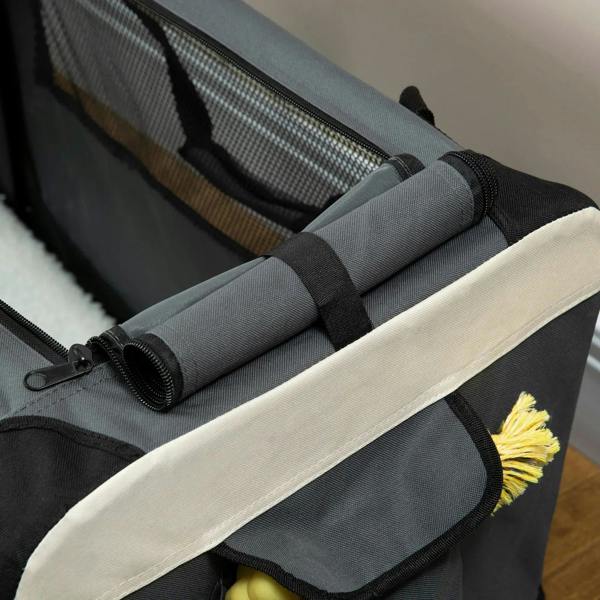 Grey pet carrier close-up of rolled straps and cream trim detail