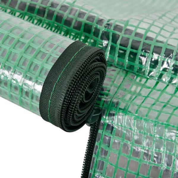 Green PE greenhouse cover close-up with black zipper and reinforced seam edge