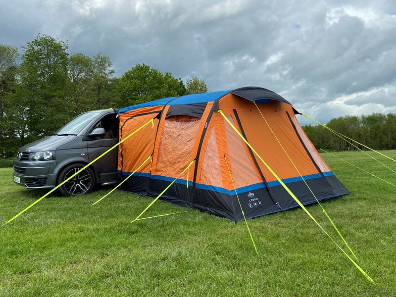 OLPRO's Loopo Breeze® v2 Inflatable Campervan Awning attached to a volkswagen T5 camper imageset:Orange