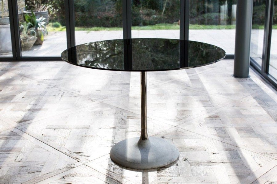 SWAN Dining Tables with a concrete base by Gillmore British Design