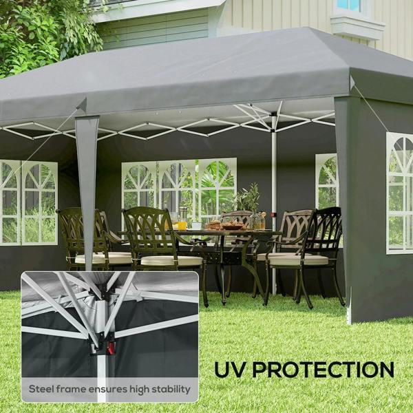 Grey pop-up gazebo with removable walls, window panels, and open interior for seating