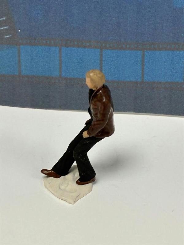 a small figurine of a man
