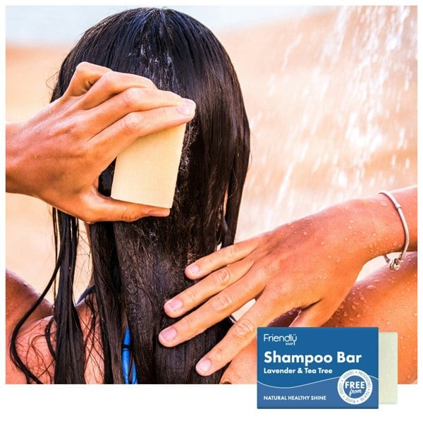 Woman washing her hair in the shower