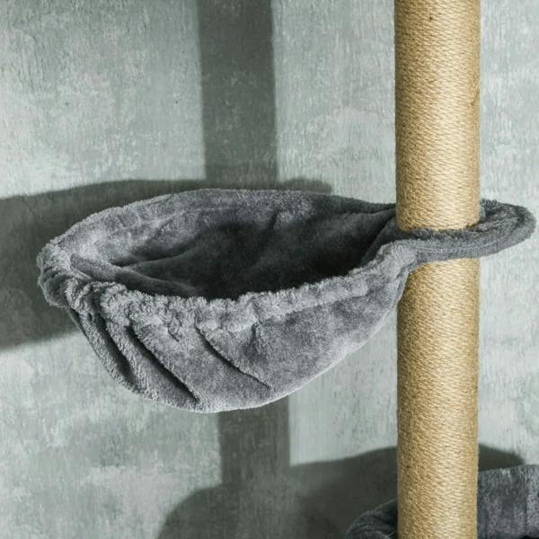 Grey plush hammock bed attached to a tall cat tree post