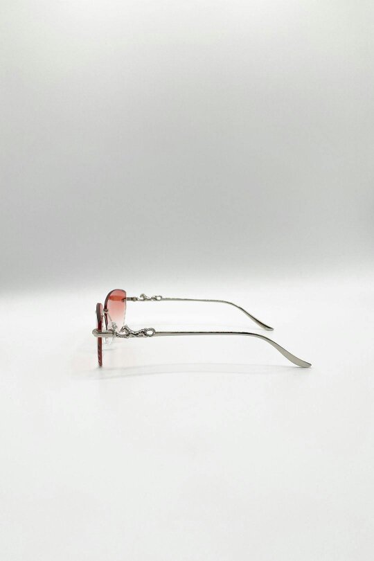 SVNX Cat Eye Rimless Sunglasses In Orange