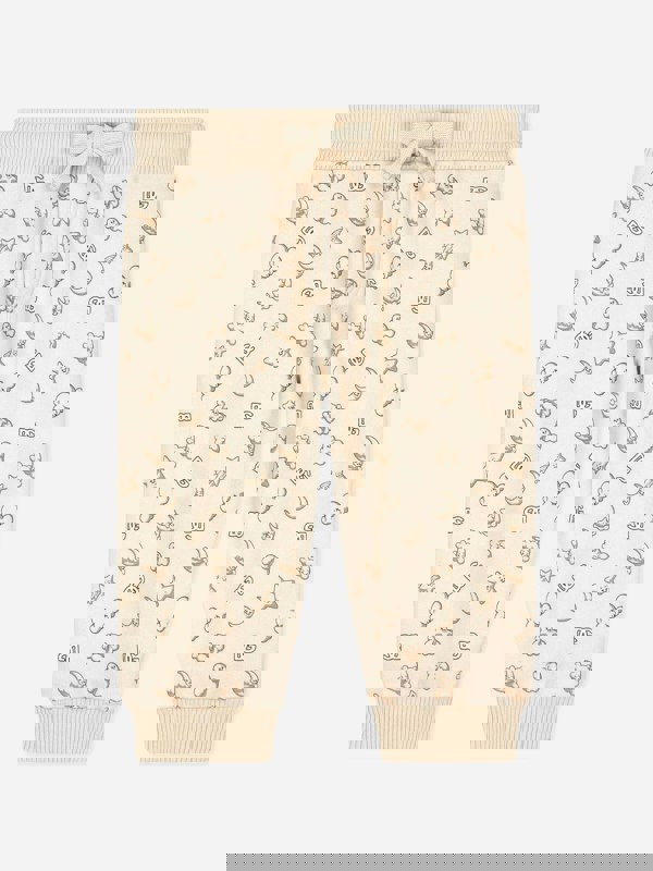 Dolce & Gabbana Kids Dolce & Gabbana Baby Moon and Star Joggers in Beige