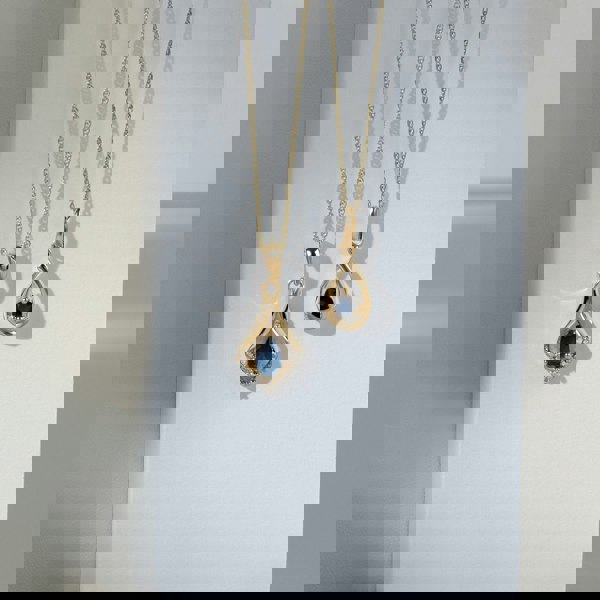 Gemondo Classic Pear Sapphire & Three Diamond Leaf Halo Pendant in 9ct Yellow Gold