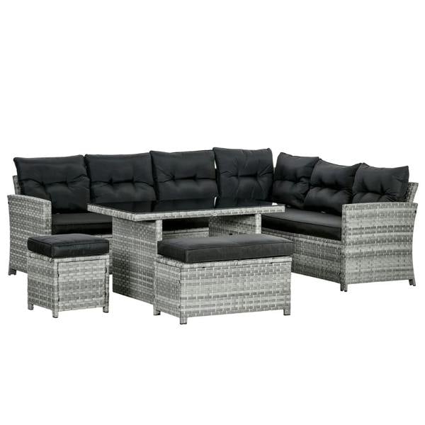 Grey rattan corner sofa set with black tufted cushions and matching footstools