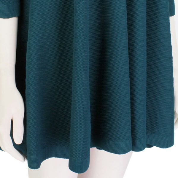 Alaia dress in petrol blue with flared hemline fit and flare