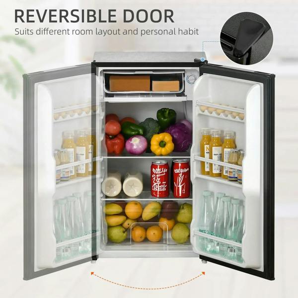 Open black mini fridge with storage bins and a reversible-style door swing