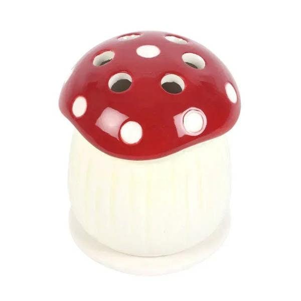 Ceramic mushroom incense cone holder with red dotted cap and cream ridged body