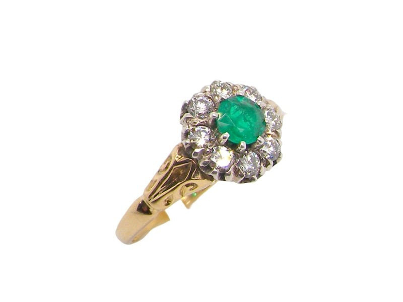 Vintage Tom A vintage Emerald and Diamond cluster ring