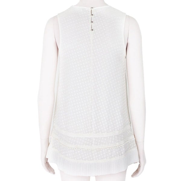 Proenza Schouler ivory tunic top in an embossed polka dot pattern
