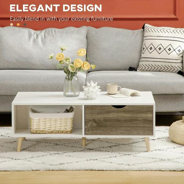 White coffee table with open shelf and two drawer fronts in dark wood tone