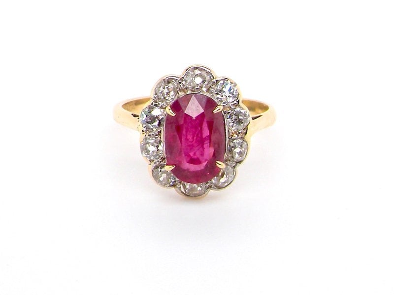 Vintage Tom A fine ruby and diamond cluster ring