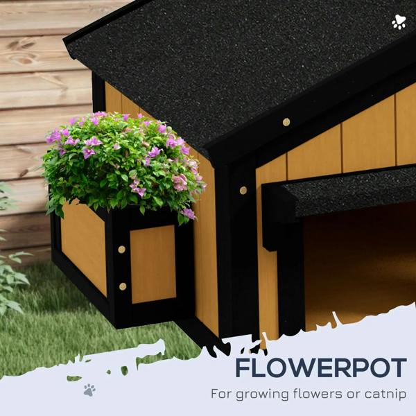 Yellow wooden cat house with built-in flower pot planter box and black sloped roof overhang