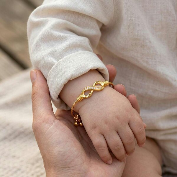 The Colourful Aura 18ct Gold Plated Infinity Crystal Adjustable Bangle Bracelet with Bell Charms