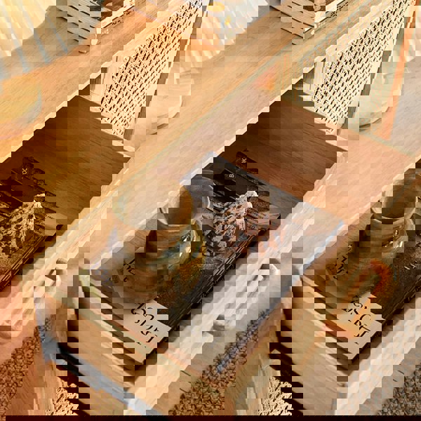 Detail view of Madeline Rattan Sideboard, Small with navy blue sideboard