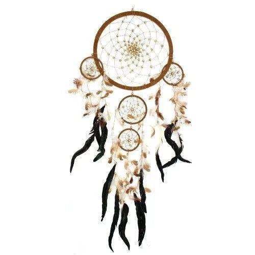 Round dreamcatcher with brown hoop, white web, and cream with black feather accents