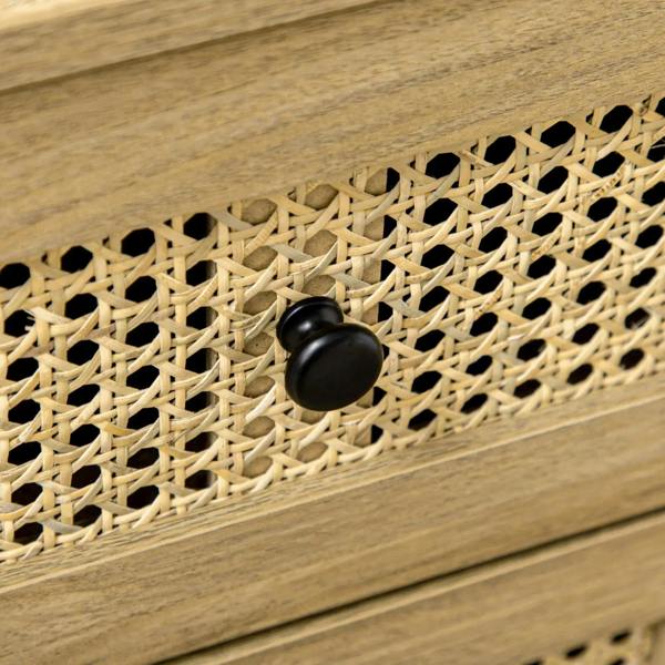 Close-up of rattan drawer weave with black round knob on wood-effect cabinet