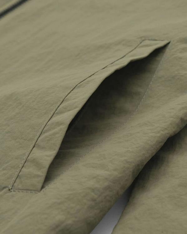 Lambretta Kalmar Mens Military Utility Casual Smart Coat Jacket, close-up of the khaki fabric and front pocket detail.