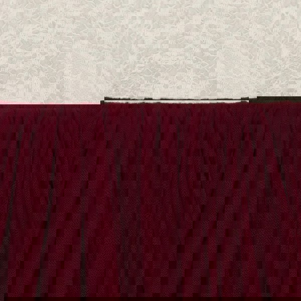 Close-up of burgundy fabric with a textured white lace background