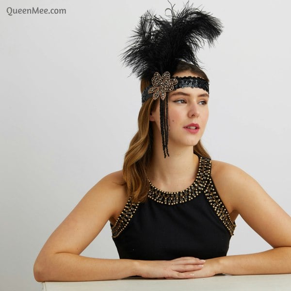 black boho headpiece, feather detail, floral embellishment, beaded band, statement accessory