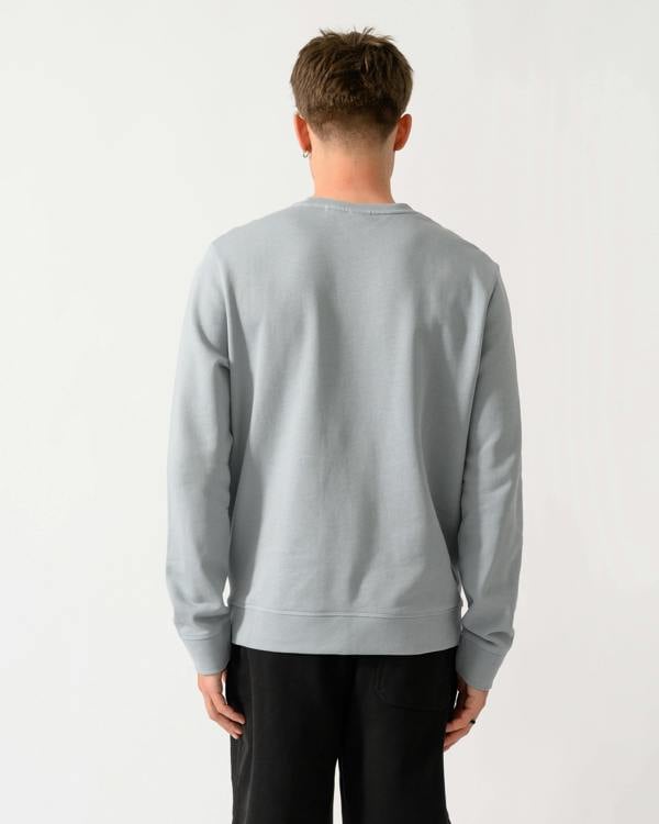 back shot of a model wearing a BOSS Orange Westart Mens Crew Neck Sweatshirt With Logo Patch in Open Grey 084