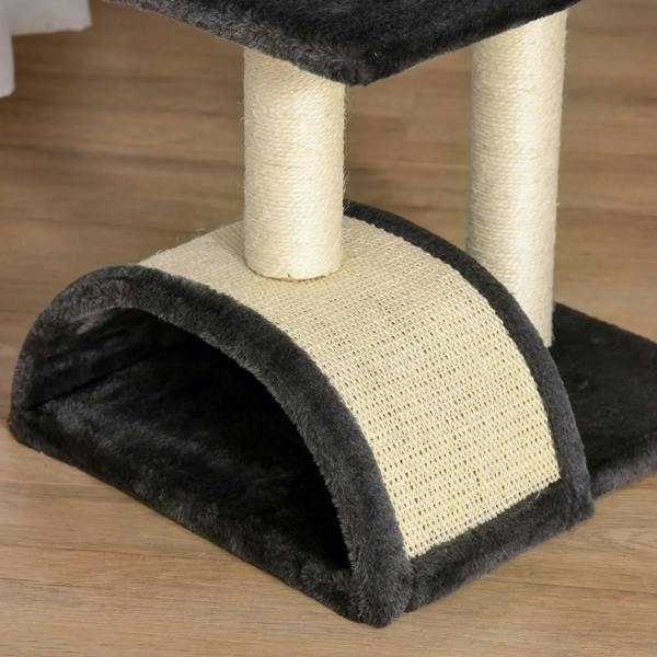 Black arched scratching pad with beige sisal panel on a dark platform