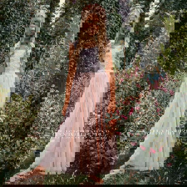 Girl wearing blush pink dress