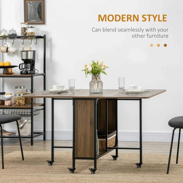 Brown drop-leaf dining table with black frame and central storage cabinet, on casters