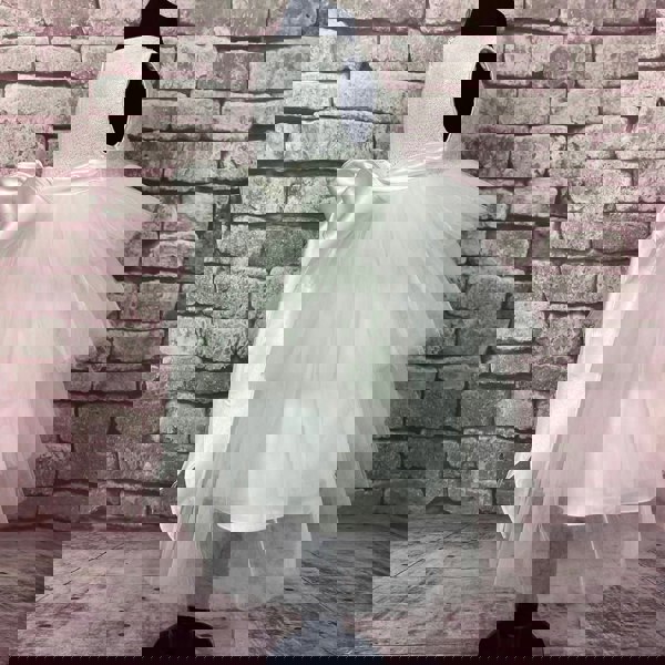 Side image of dark whit occasion dress