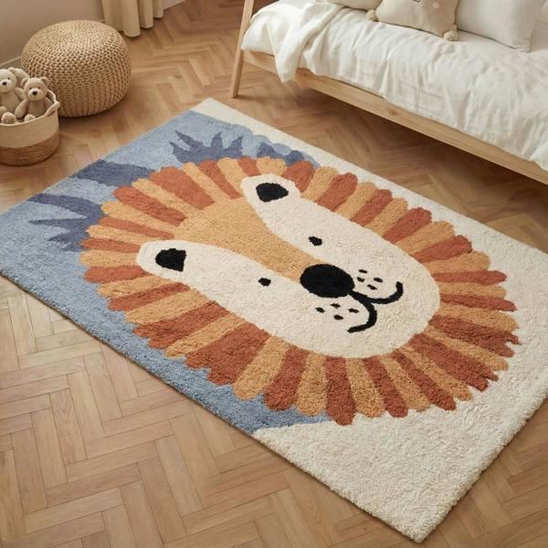 Children's rug with a lion design on a wooden floor
