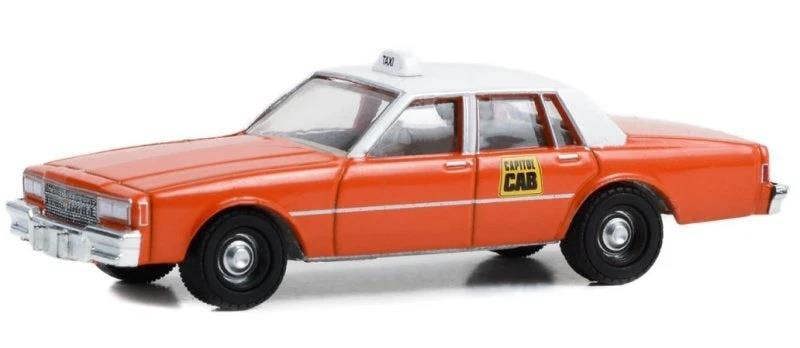 MCSlots 1981 Chevrolet Impala Capitol Cab Taxi with Figure 1:64 Greenlight 97150B