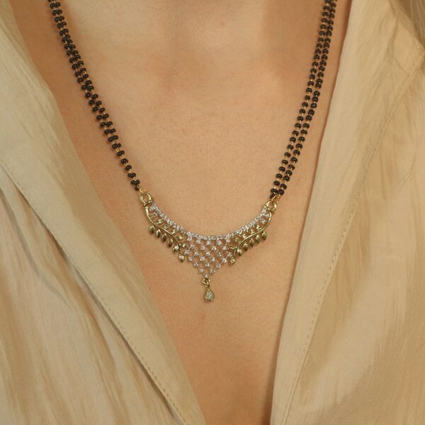 The Colourful Aura Indian Nazaria Gold Leaf Floral Zircon Mangalsutra Black Beads Pendant Necklace