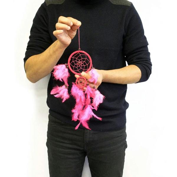 Red round dreamcatcher with net center, pink feather fringe, and bead details