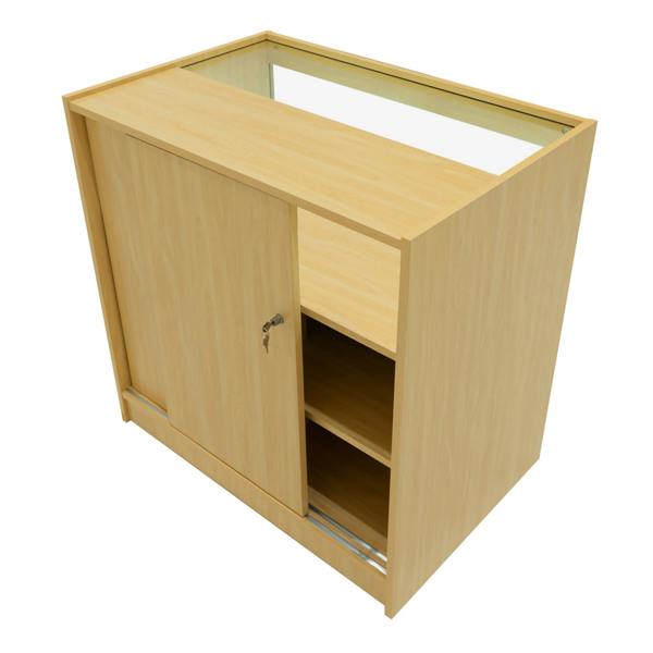 Maple Iris LED shop counter set with sliding door, glass top, and open shelving, showcasing a modern, sleek design for retail spaces