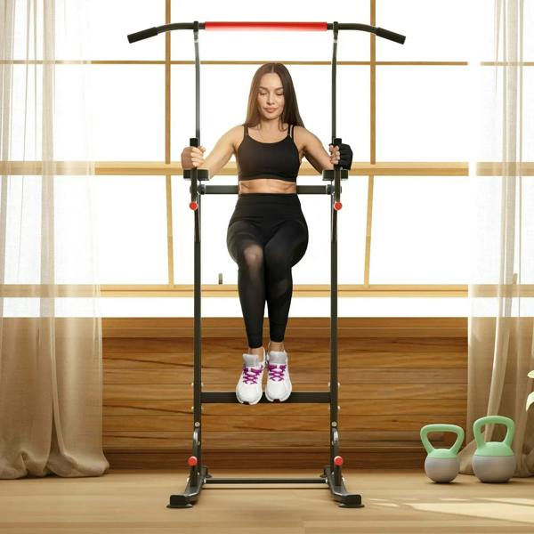 Pull-up power tower with black frame and red bar for bodyweight training