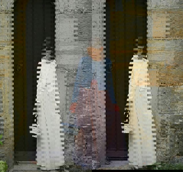 young flower girl in church way