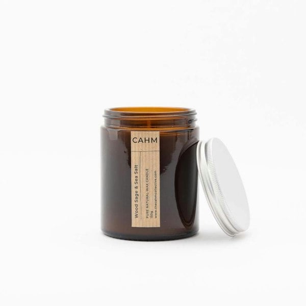 A Wood Sage and Sea Salt Candle from the Amber Jar Candle collection by The CAHM Collective.