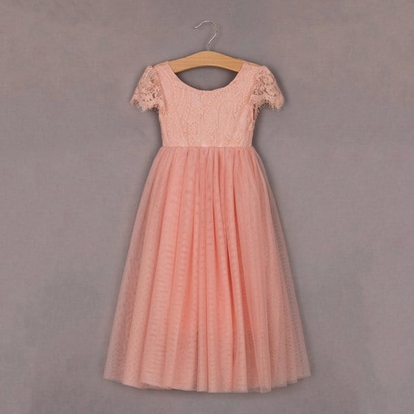 A pink, floral patterned coral lace bodice and tulle skirt flutter dress for children, displayed on a hanger.