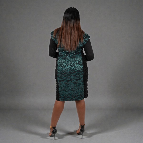 Women's Plus Size Black Forest Green Bodycon Midi Leopard  Jacquard Dress shown from the back, styled with gold chain heels for an elegant, polished look.